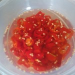 Step 2: Marinating the peppers in a mixture of white wine and vinegar