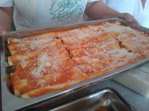 A pan filled with cannelloni ready to be baked