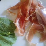 Thinly sliced prosciutto and fresh mint leaves