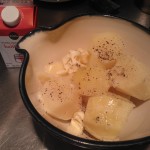 Cooked golden potatoes ready to be mashed with butter, seasonings, and half & half