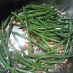 Green beans sautéed in butter with fresh thyme and chopped almonds