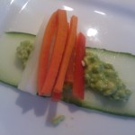 Thinly sliced cucumber topped with mashed avocado and the julienned vegetables