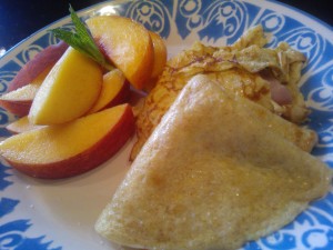 Whole wheat crepes filled with thinly sliced ham and butter
