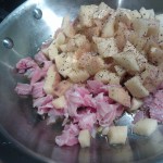 Sautéing the pancetta and potatoes in a touch of olive oil