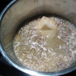 Cooking the garlic in melted butter and oil, with a touch of anchovy paste