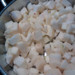 Cooking the apples in sugar, water and lemon juice