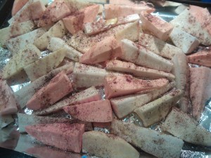 The root vegetables, cut into wedges and ready to be roasted