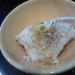 Ricotta cheese flavored with lemon zest, salt and pepper