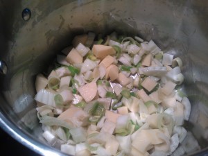Sautéing the potatoes, leeks & fennel in olive oil