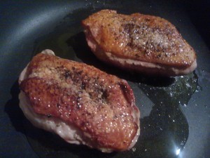 Searing the duck breasts