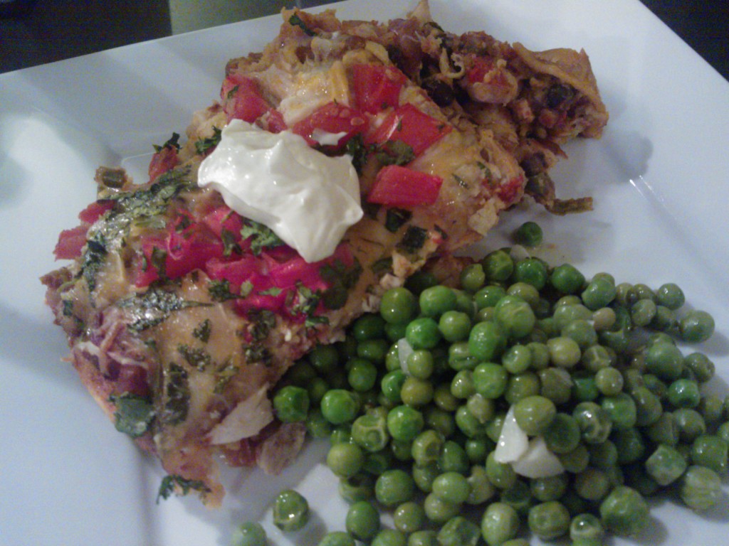 Cooking Light's '20-Minute Chicken Enchiladas' served with a side of tender green peas