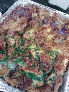 The colorful, decorated top of the King Cake Bread Pudding