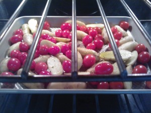 Roasting the potatoes along with the cherry tomatoes