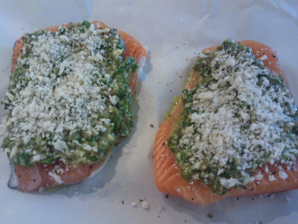 The salmon filets, coated with the gremolata and ready to be baked